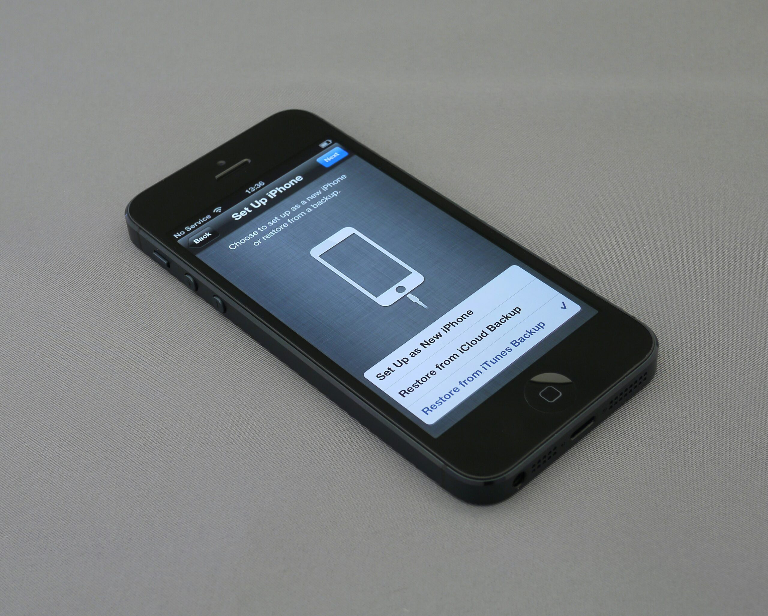 iPhone setup screen. Restore from iCloud or set up a new iPhone. Mobile Apps.
