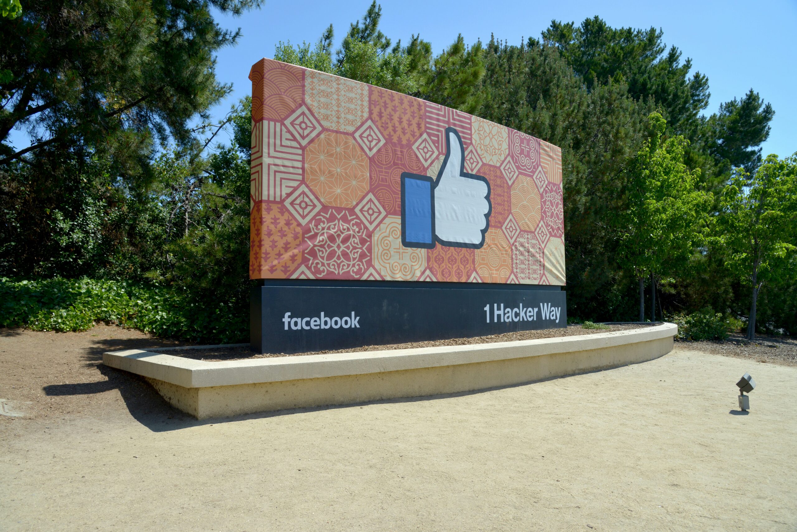 Facebook sign with thumbs-up logo, promoting Facebook Ads and campaign management.