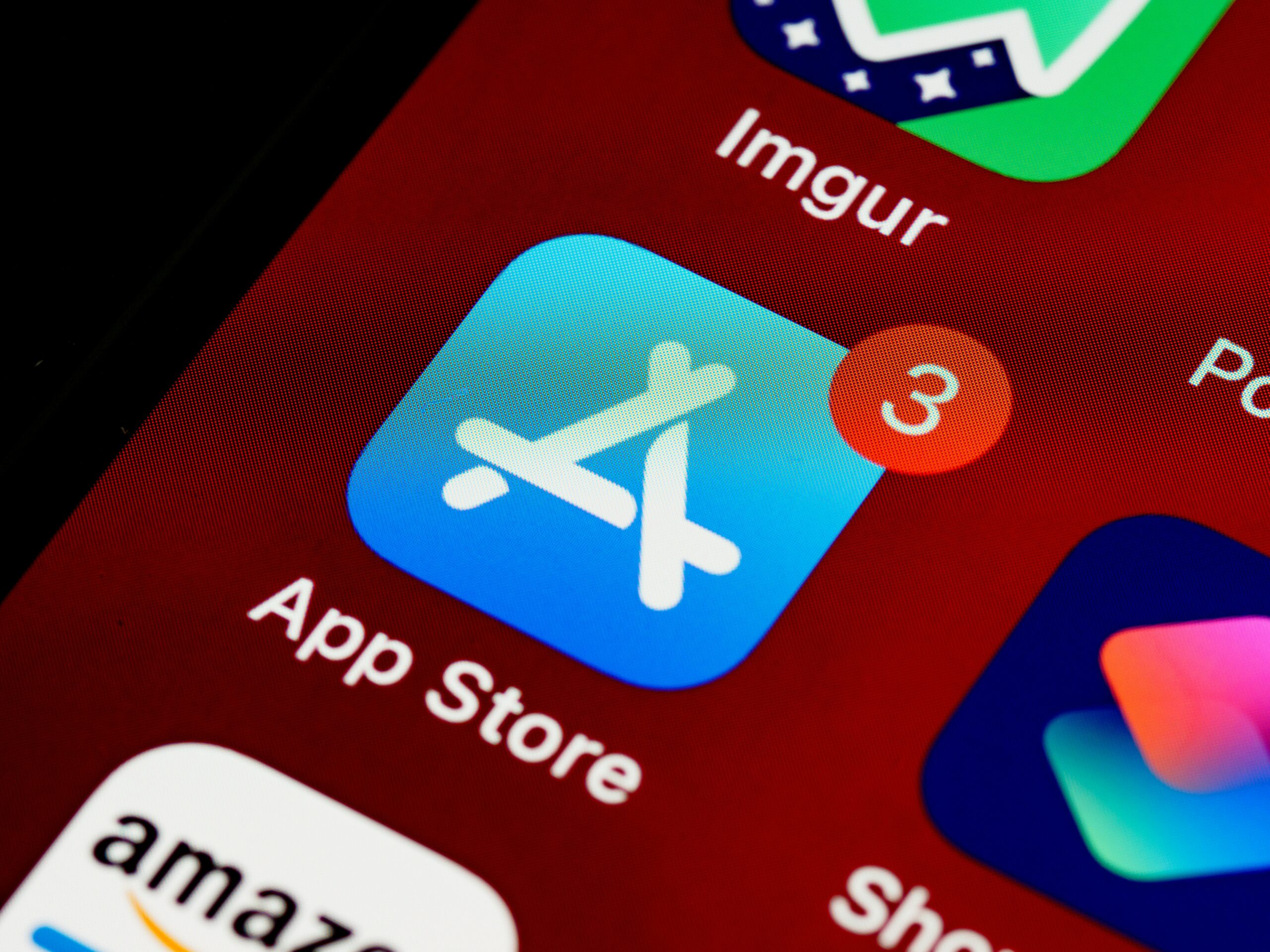 App Store icon with a notification, indicating available app updates, relevant for app store optimization.