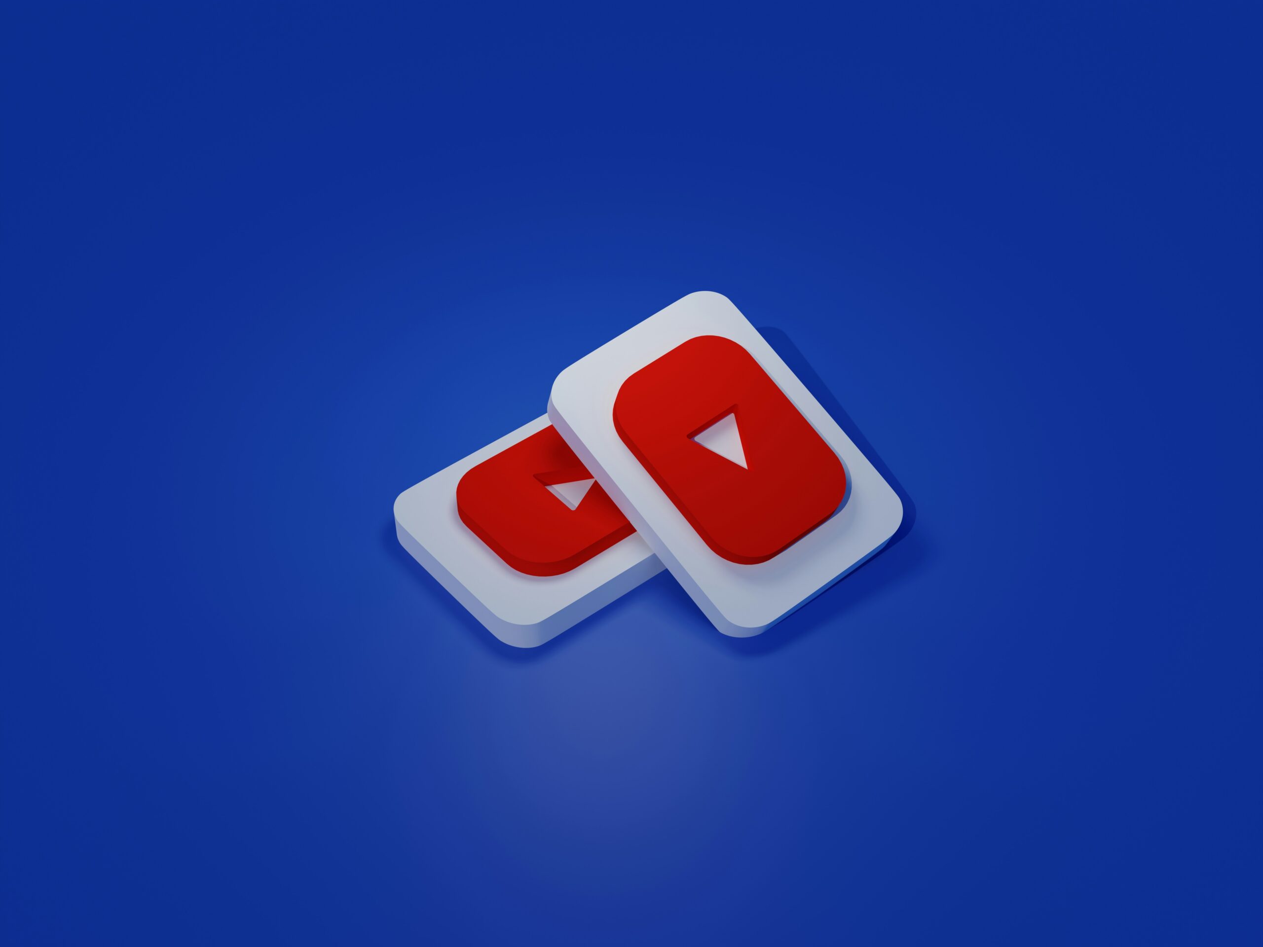 Two YouTube icons on a blue background. App Marketing and ASO can boost your mobile app visibility.