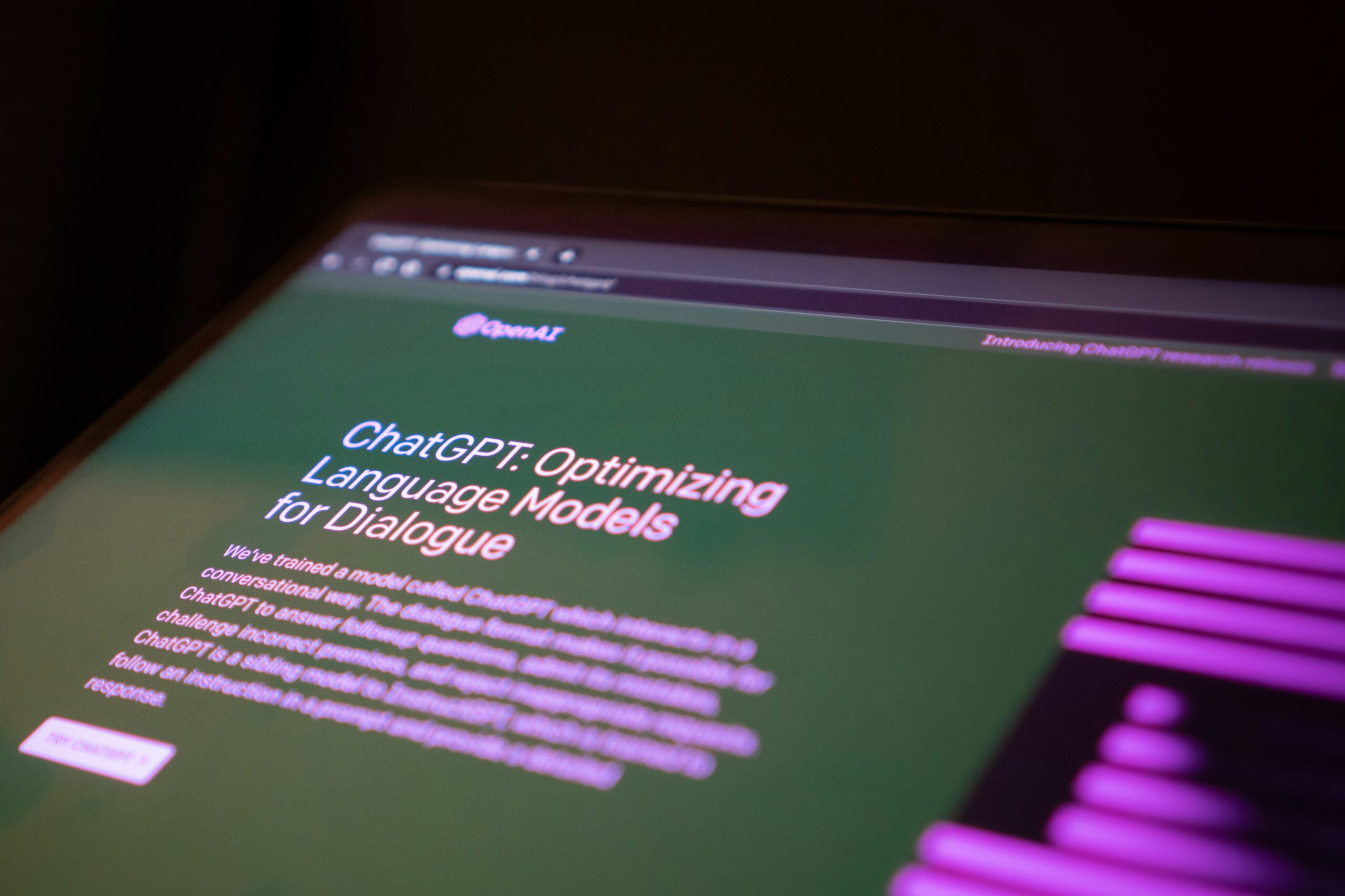 Close-up of a laptop screen displaying ChatGPT interface.