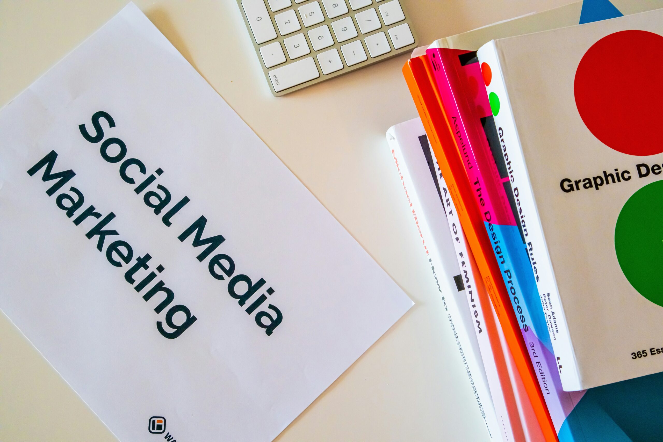Social Media Marketing document with books. App marketing and search engine optimization.