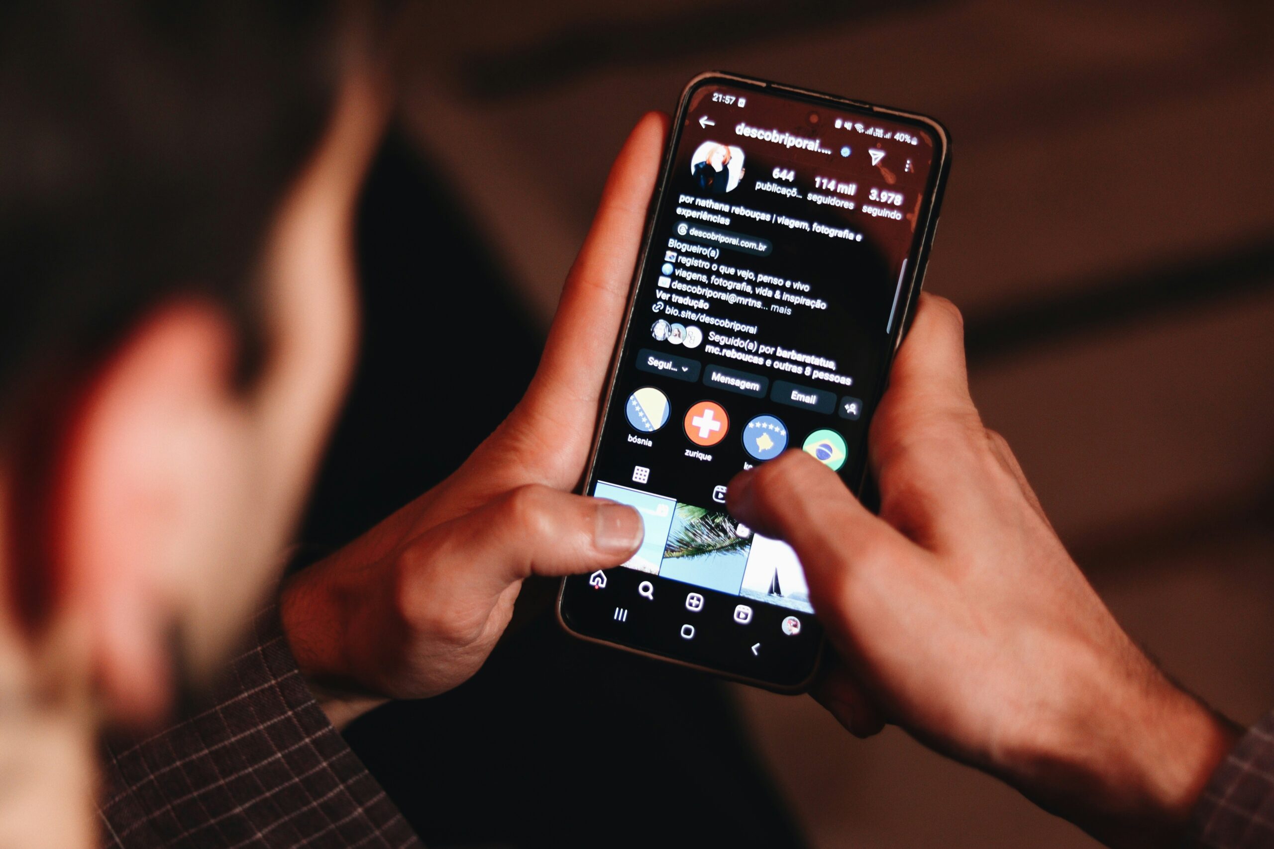 Person using Instagram on a smartphone. Social Media Marketing and promotion for app downloads and organic reach.