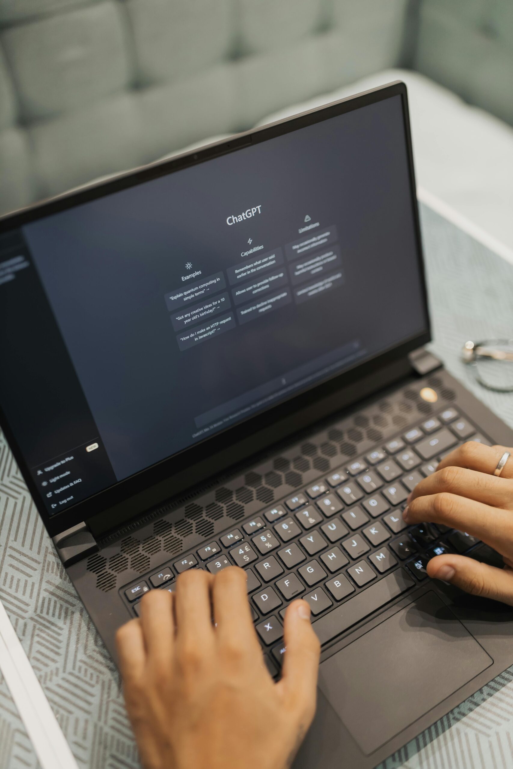 Person using ChatGPT on a laptop, showcasing AI capabilities.