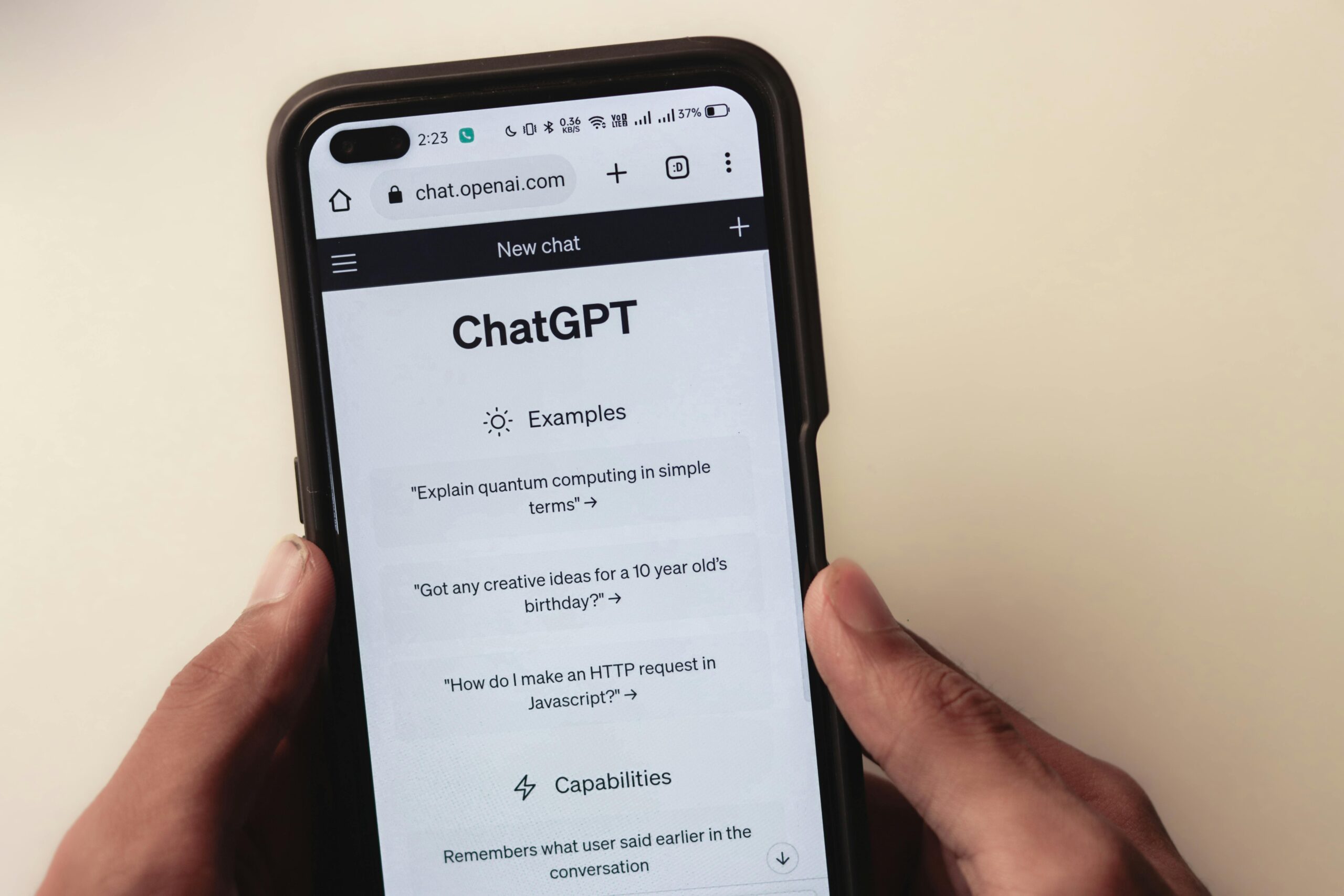 Phone screen displaying ChatGPT, an example of AI digital marketing.