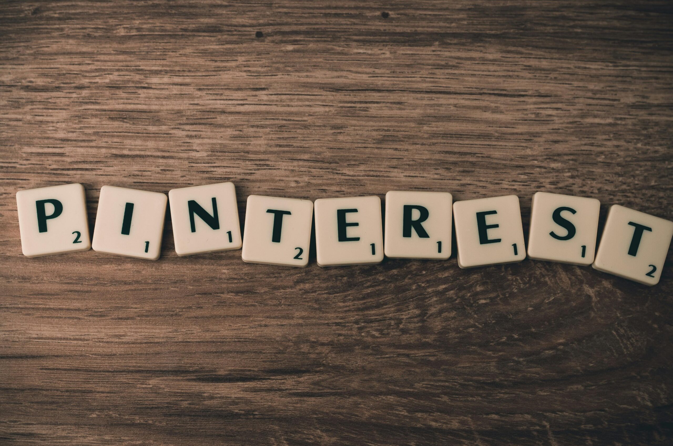 INTEREST spelled out with Scrabble tiles.
