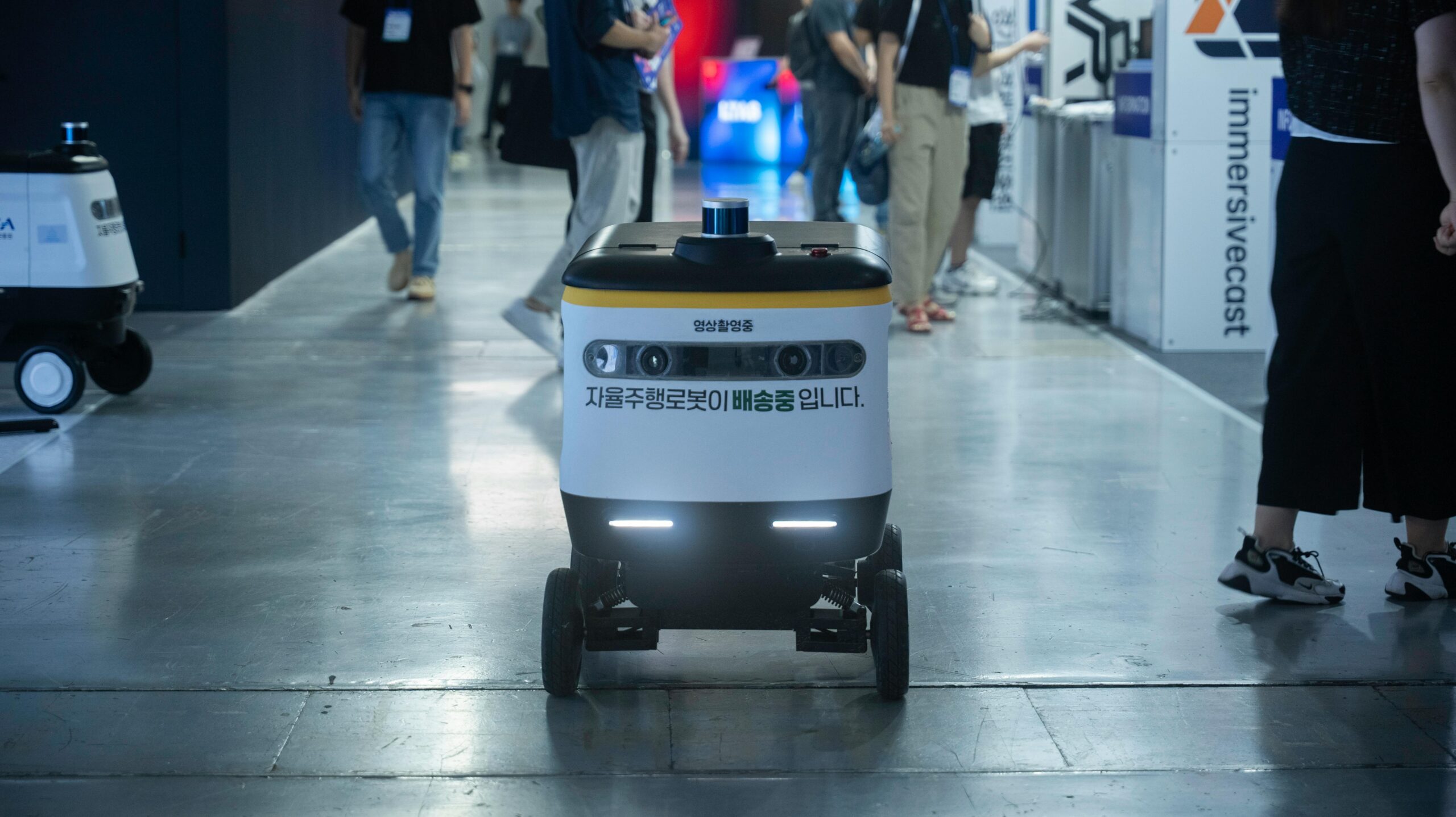Autonomous delivery robot in an indoor setting. AI, digital marketing, and automation.