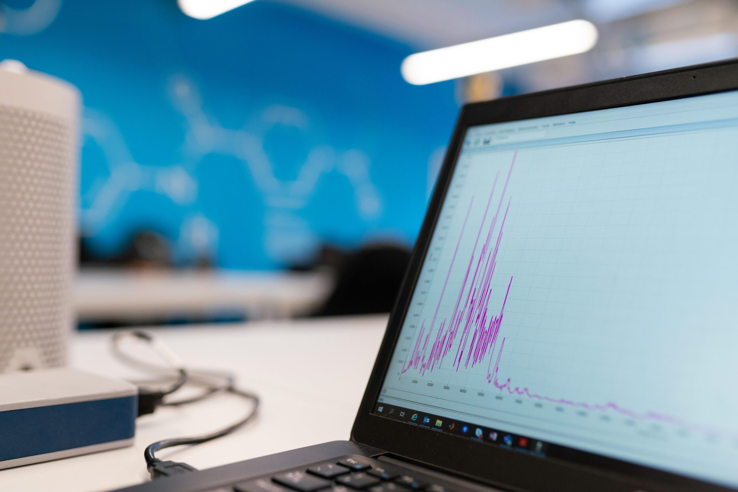 Laptop displaying a graph showing growth. Digital marketing strategy.
