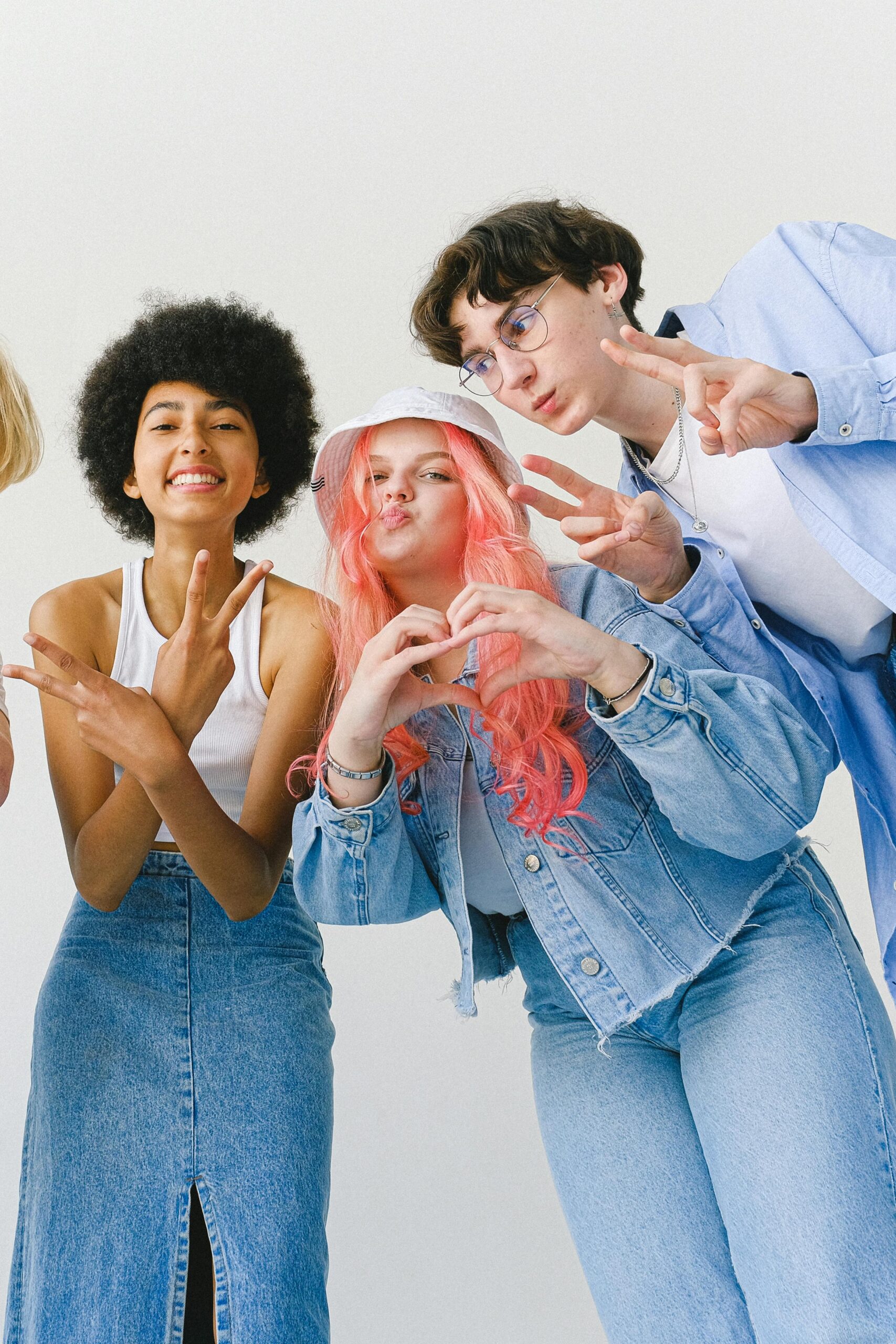 Group of young people making hand gestures. Digital marketing team.