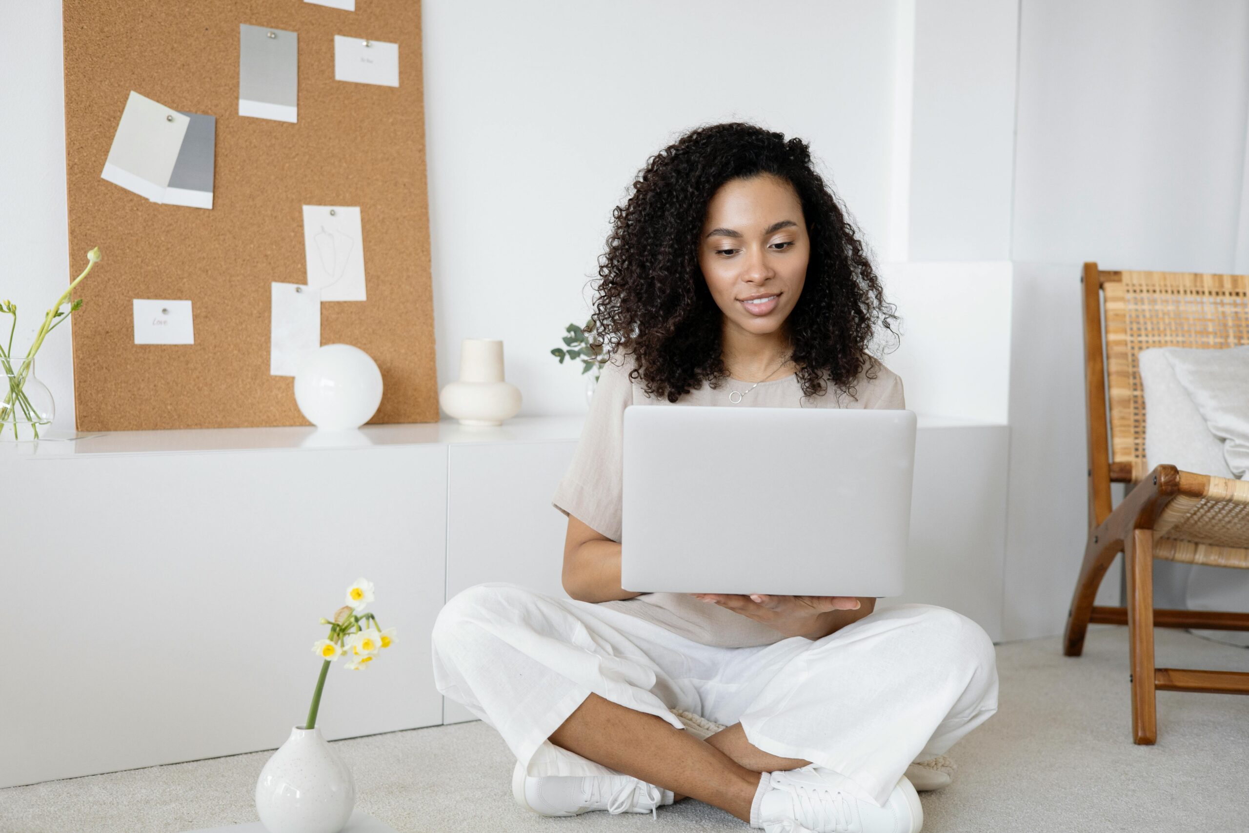 A business owner working on core business tasks while a marketing agency manages their Google Ads campaigns in the background. The image should convey a sense of efficiency and productivity.