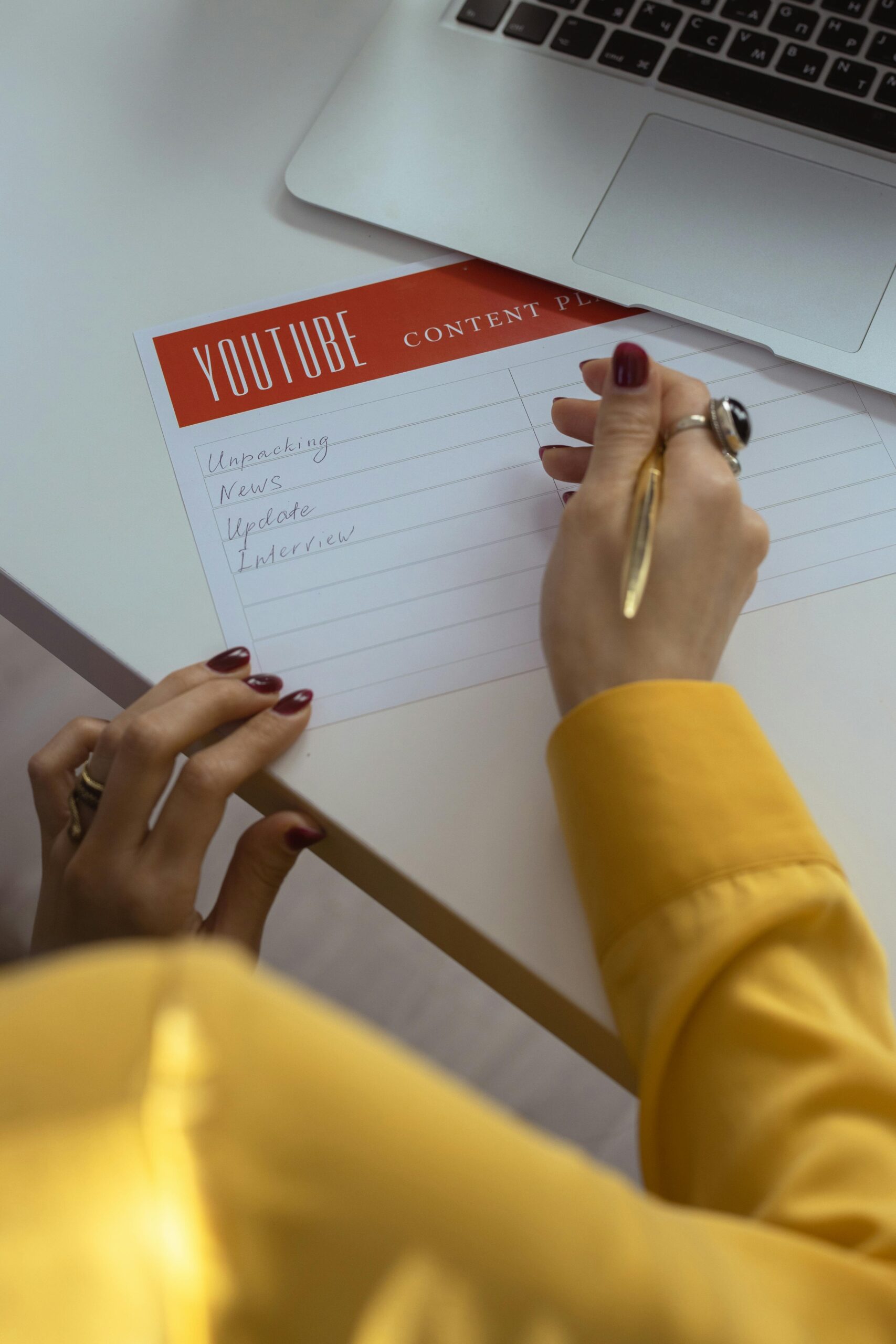 A person working on a blog post or content creation, with a background that suggests a modern office environment with a focus on digital marketing and content creation.