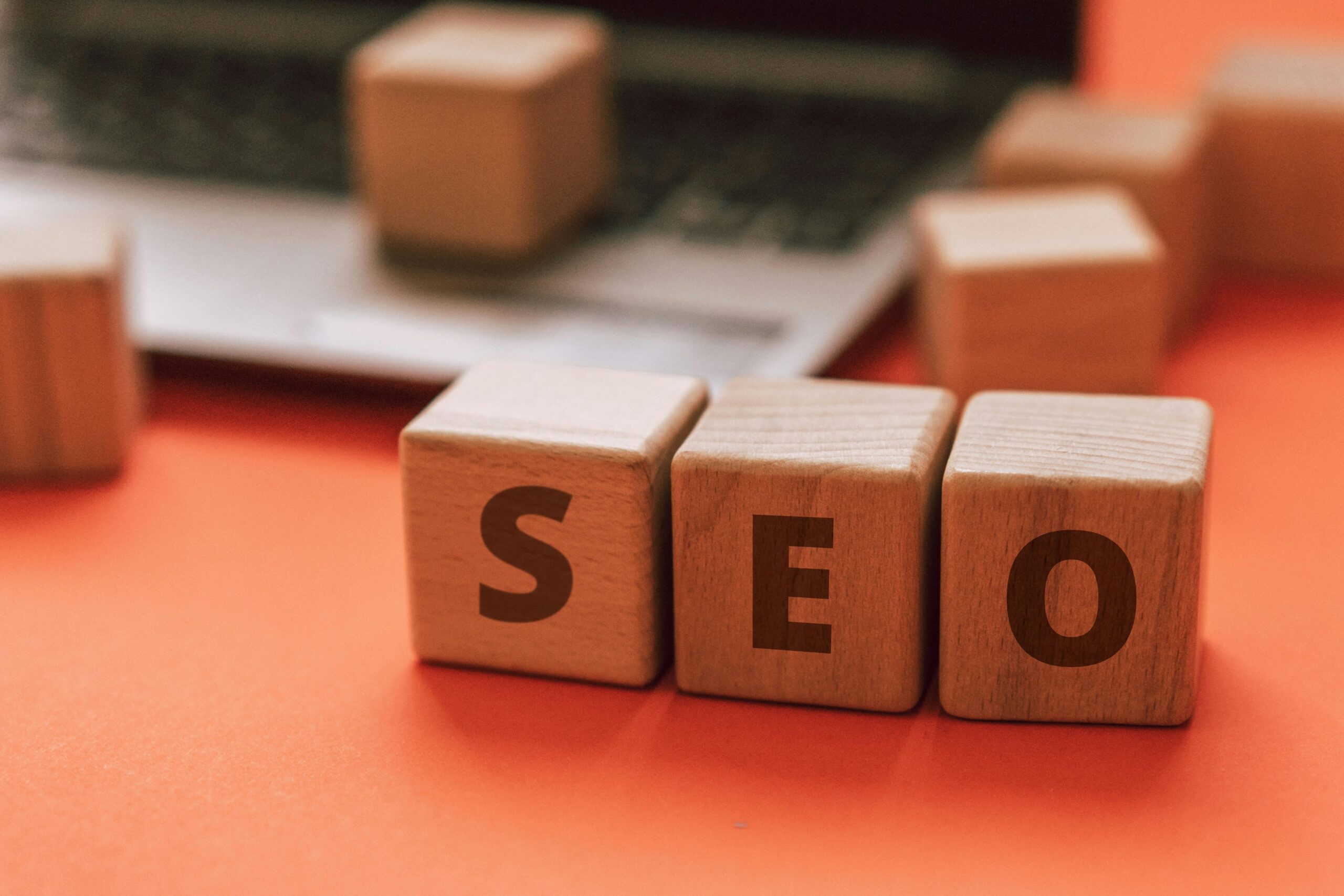 A graph showing an upward trend in website traffic, with keywords and search engine results pages (SERPs) in the background. The scene should be brightly lit and professional, emphasizing the positive impact of SEO.