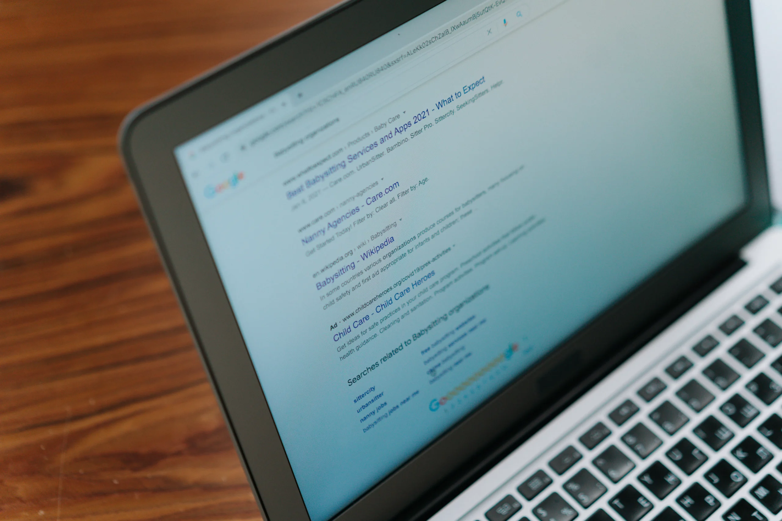 A search engine results page showing a website ranking high for relevant keywords, demonstrating the effectiveness of SEO services. Description: Search engine results page highlighting top ranking, achieved through effective SEO services, enhancing online audience reach.