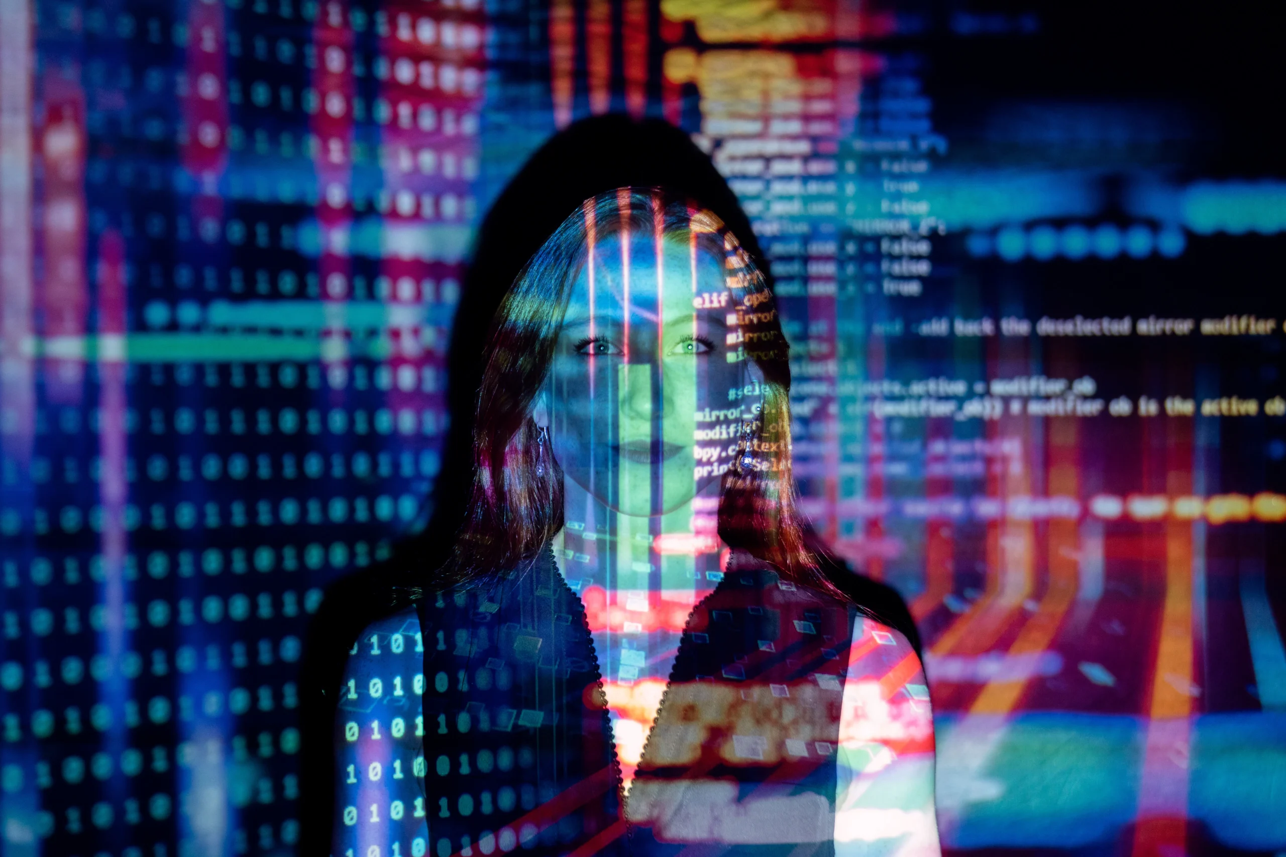 Abstract image of a woman with digital code overlay, representing technology and data-driven strategies in native advertising and the work of a digital marketing agency.