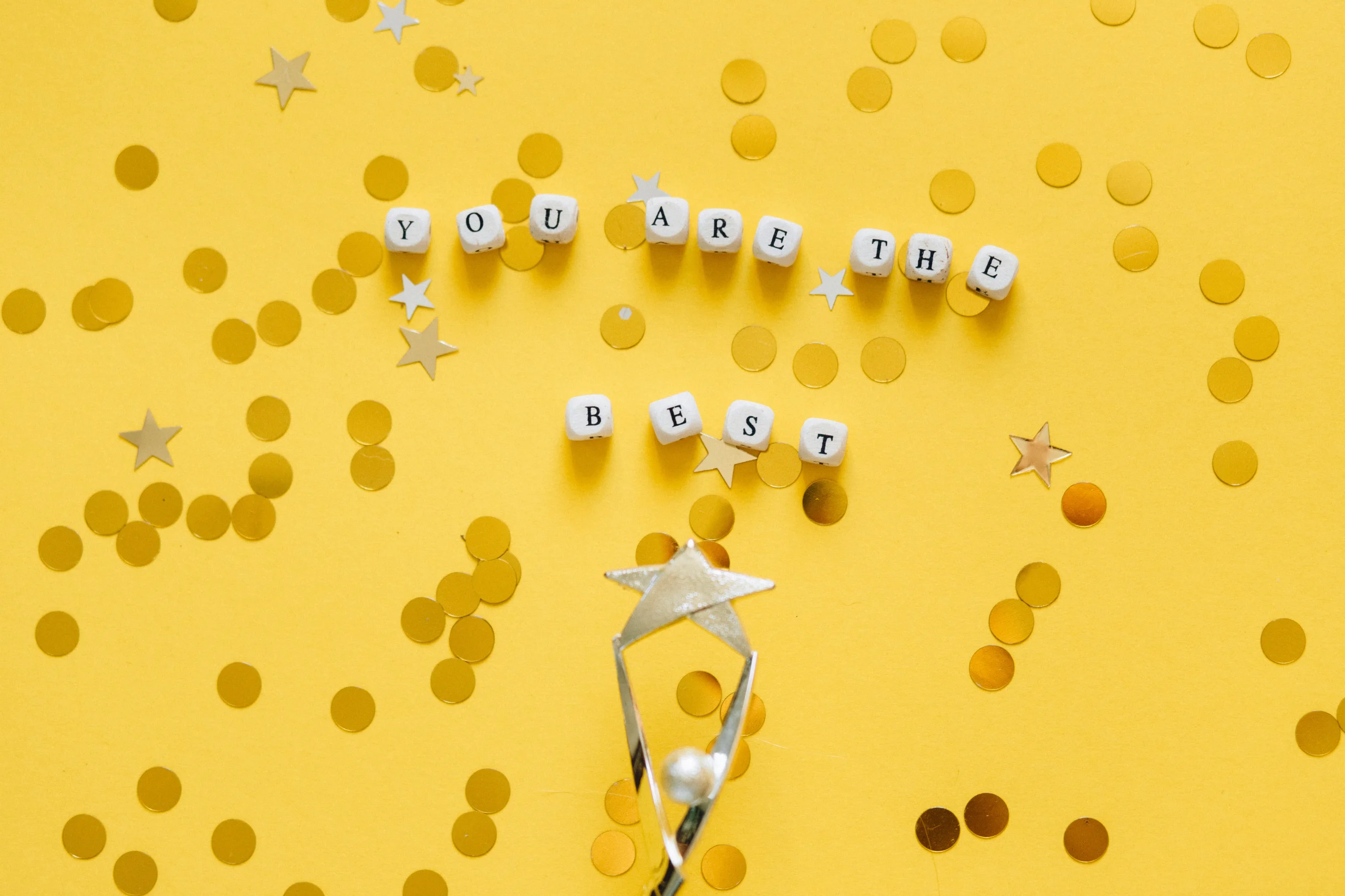 Celebratory image with the words 'You are the best' surrounded by confetti, symbolizing success and achievement from a top native ad agencies.